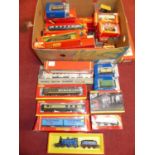 A large collection of mixed 00 gauge boxed wagons, locomotives, and accessories to include a