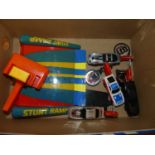 A collection of Kidco 1980s 871 Rally stunt ramp diecast vehicles, key starts and accessories