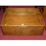 A stained beech table top chest, the hinged cover enclosing three long drawers, and open