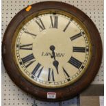 A Victorian mahogany circular wall clock, having a repainted dial titled London (lacking convex
