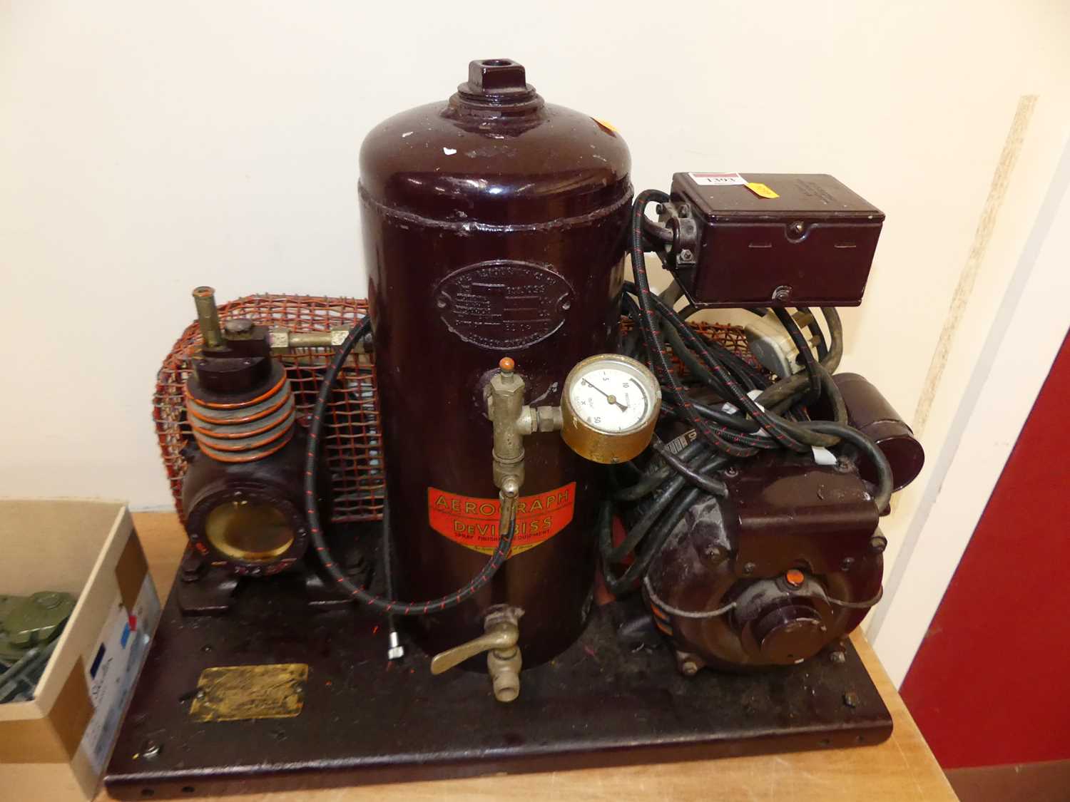 An Aerograph Devilbiss spray finishing equipment, boxed compressor and engine system
