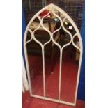 A contemporary Gothic style painted wrought iron lancet arched wall mirror, 125 x 65cm