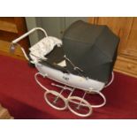 A mid-20th century Silver Cross dolls pram