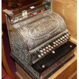 An early 20th century American silvered cast metal cash register