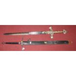 A contemporary Spanish chromed and gilt metal ceremonial sword, the handle and hilt decorated with