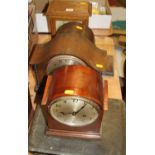 A collection of five early 20th century mantel clocks; together with a cased plated cutlery set