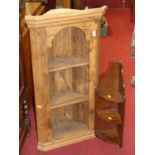 A rustic stained pine hanging corner shelf, height 95cm, together with a small hanging three-tier