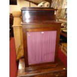 A Regency rosewood narrow chiffonier, having raised superstructure and single glazed door, width