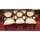 A set of ten Victorian and later manufactured mahogany balloon back dining chairs, having yellow