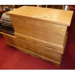 A modern pine hinge top blanket chest, width 93cm, together with a further modern pine long hinged