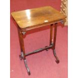 A Victorian rosewood round cornered occasional table, raised on twin square end supports to scroll