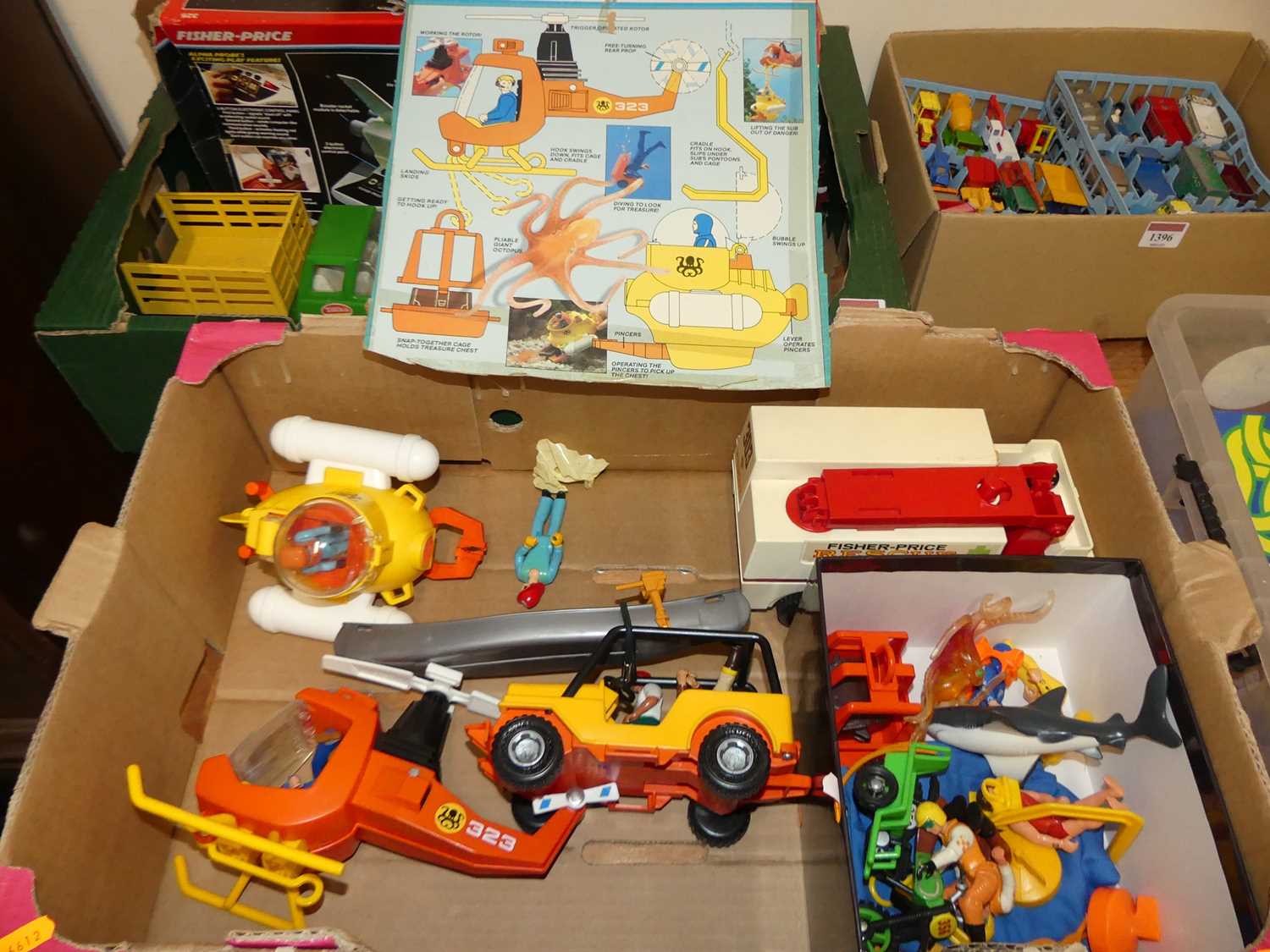 One box of Fisher Price toys to include Air Sea Rescue, a Fisher Price rescue fire engine