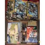 Two boxes of sci-fi related action figures and accessories to include Star Trek, Star Wars, and