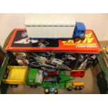 A collection of mixed loose diecast vehicles, tinplate models and boxed toys to include a No. 325