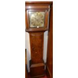 A late 18th century provincial oak long case clock, having a square brass dial signed Phillips, 30-