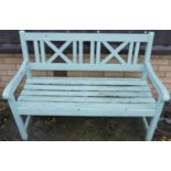 A blue painted teak slatted two-seater garden bench, width 121cm