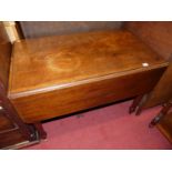 A Victorian mahogany round cornered Pembroke table, having single end drawer and on turned supports