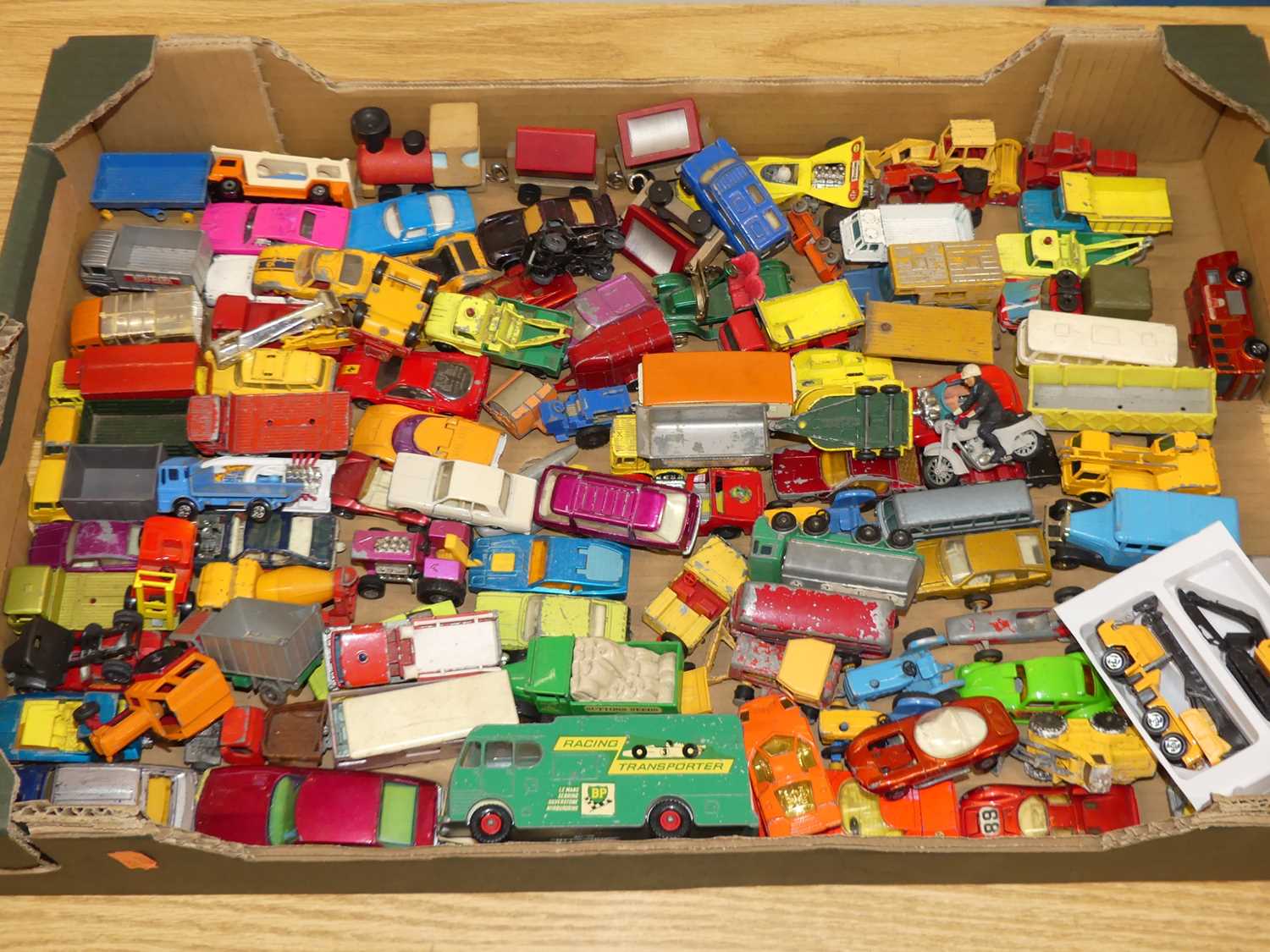 A tray of mixed playworn, repainted and loose diecasts, to include a No.25 Matchbox Ford Cortina,