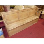 A rustic pine three-panelled long bench settle, width 190cm