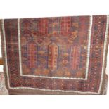 A Caucasian woollen brown ground rug, having kilim ends, 170 x 114cm
