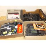 Three boxes of mixed 00 gauge track and rolling stock to include 0-1 master control unit, and