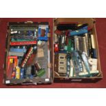 Two trays of mixed 00 gauge rolling stock, line side accessories, some boxed examples, Dapol wagons,