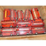 A collection of 11 loose and playworn Corgi and Dinky toy public transport diecast vehicles