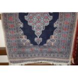 A small Persian woollen blue ground Shiraz rug, 120 x 78cm