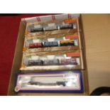 A collection of boxed Bachmann 3-piece coal trader classics gift sets, together with a Bachmann Well