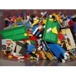 One box of mixed vintage Lego to include some instruction leaflets