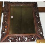 A Victorian carved oak framed wall mirror, 68 x 85cm