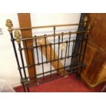 A Victorian brass and black painted wrought iron three-quarter size bedstead, having side rails