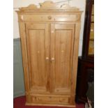 A reclaimed pine double door armoire, with single long lower drawer (supports present but require