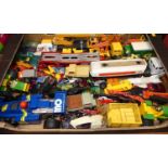 A collection of mixed diecast and plastic vehicles and accessories to include Dinky Toys, Corgi