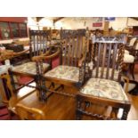 A set of six early 20th century oak barley twist and slat back dining chairs, each having floral