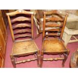 A set of three provincial 19th century elm and oak ladder back panelled seat dining chairs, together