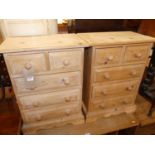 A pair of modern pine bedside chests each of two short over three long drawers, width 48.5cm