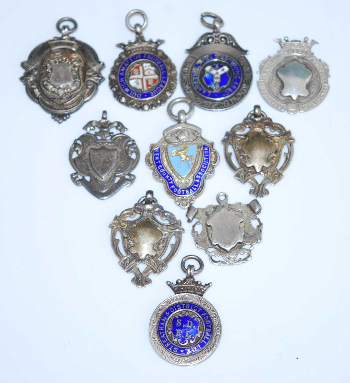 A George V silver, yellow metal and enamelled fob medal for the Tooting & District Charity - Image 2 of 2