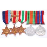 A group of five WW II medals, to include 1939-1945 Star, Africa Star with 1st Amry clasp, Italy