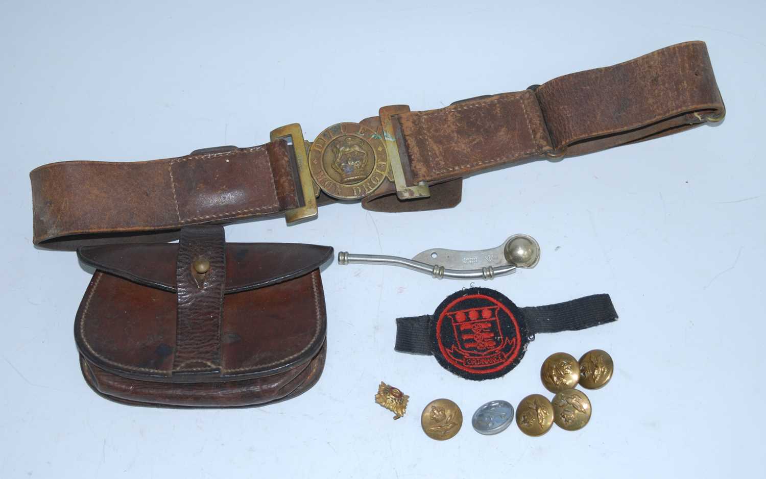 A WW I brown stitched leather belt pouch, stamped to the loop Leatheries Ltd 1916, together with a