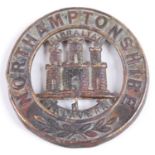 A Northamptonshire Regiment 1902-1914 other ranks helmet badge.