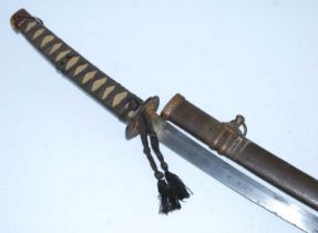 A Japanese Gendaito wakizashi, having a 55cm curved steel blade with copper habaki, pierced iron