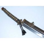 A Japanese Gendaito wakizashi, having a 55cm curved steel blade with copper habaki, pierced iron