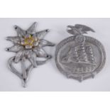 A German Edelweiss badge, together with a Day of German Seafaring badge, marked verso Paulmann &