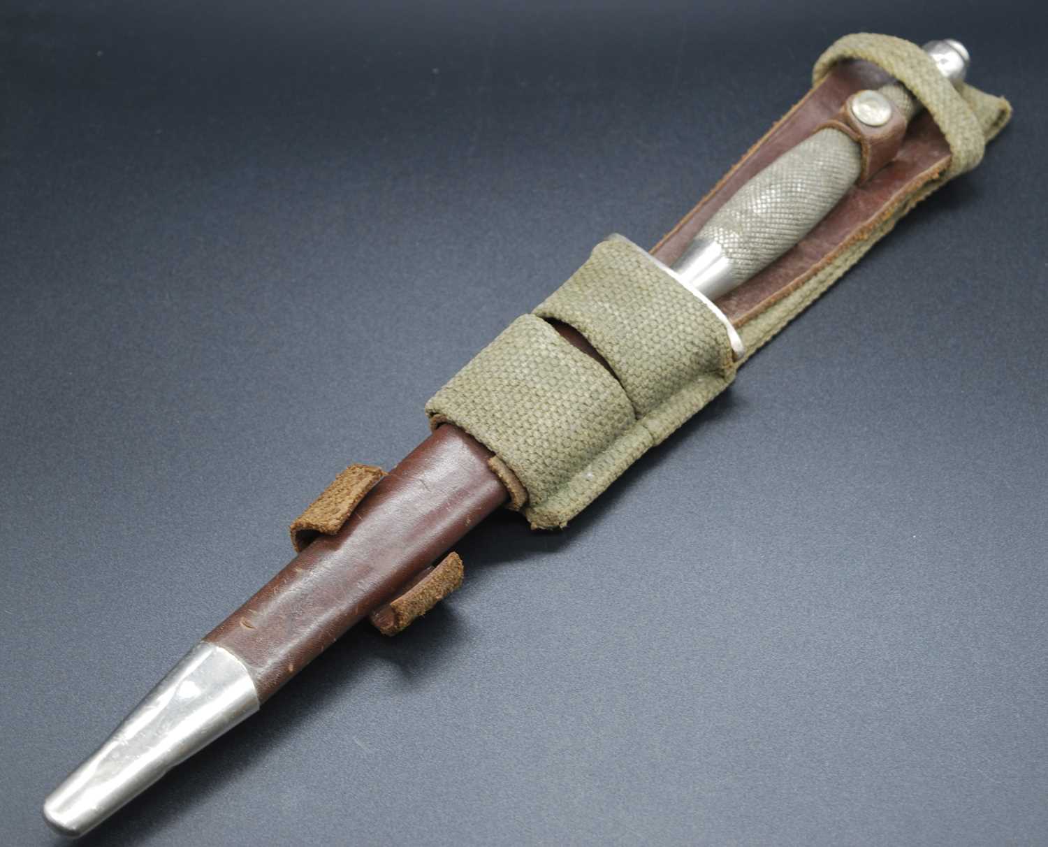 A Fairbairn-Sykes 1st Pattern Commando fighting knife, the 17cm double edged spear-point blade