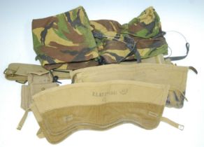 A collection of miscellaneous items to include a pair of WW II Canadian P37 ankle gaiters, marked ZL