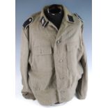A German SS tunic, with collar tabs, epaulettes and arm badge, the front with pebbled buttons and