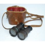 A pair of WW I period private purchase binoculars, the lens caps marked Lemaire Fab, Paris, in a