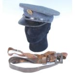 An R.A.F. Officer's peaked cap, together with various badges and buttons to include RAVC shoulder