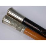 An early 20th century swagger stick, having a malacca shaft and nickel cap with crest for the